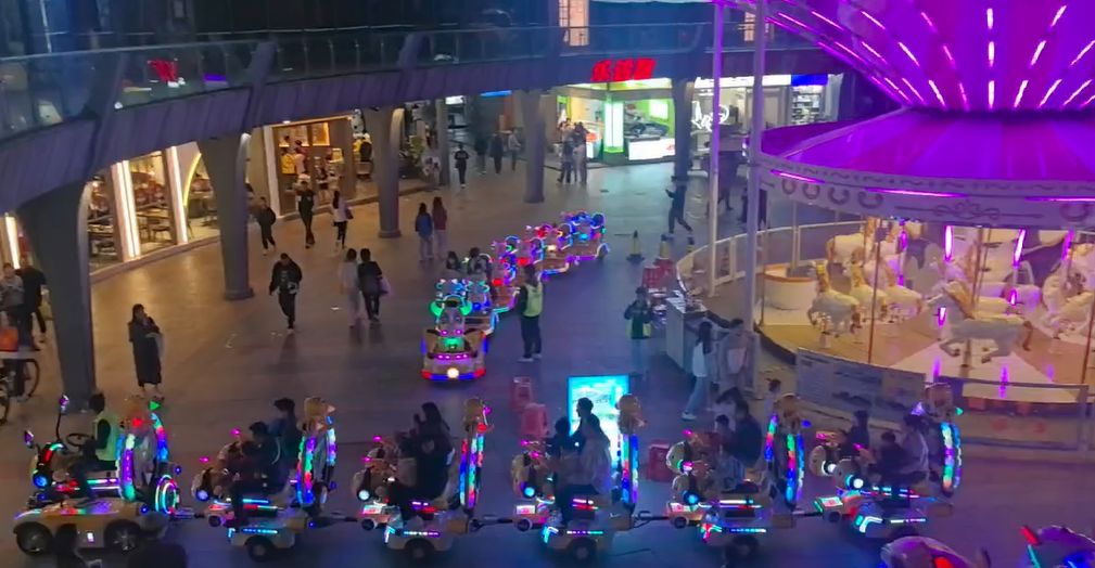 Packed mini train and carousel