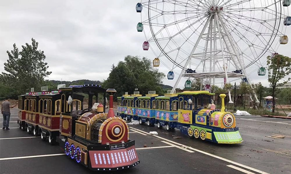 Trackless Train under the Ferris Wheel - H.Q.Amusement