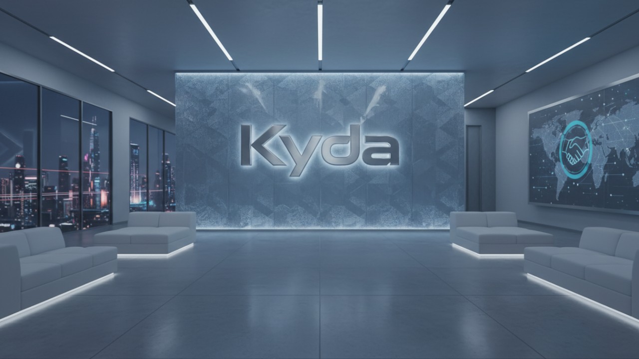 A professional corporate lobby with a premium metallic Kyda sign on the wall symbolizing global leadership and partnership.