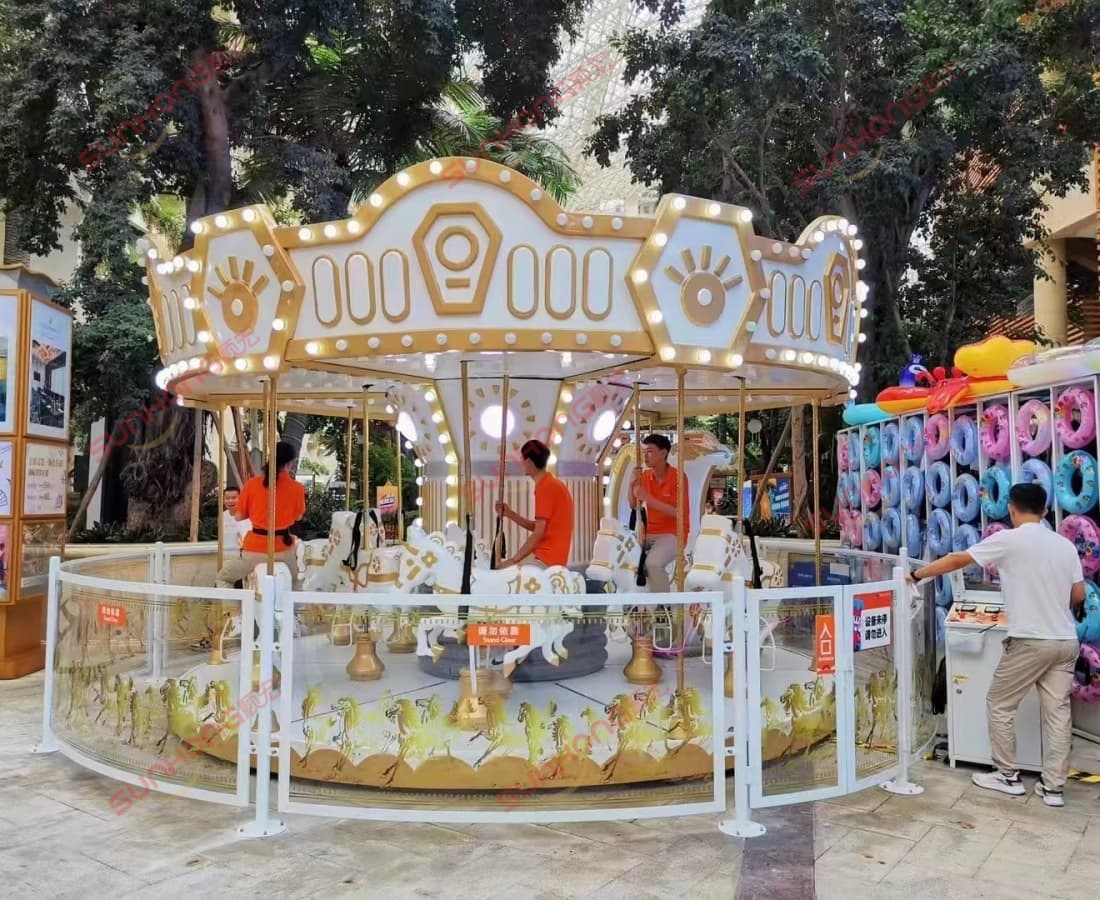 12P-Earl-Carousel-outdoor-riding People riding the 12P Earl Carousel outdoors, carousel merry go round for sale