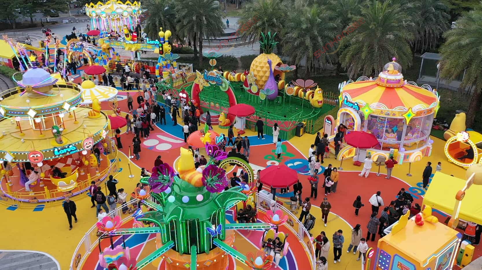 Colorful SUNHONG family rides and crowds at a vibrant Larva family theme park with carousels and palm trees. Colorful SUNHONG family rides and crowds at a vibrant Larva family theme park with carousels and palm trees.