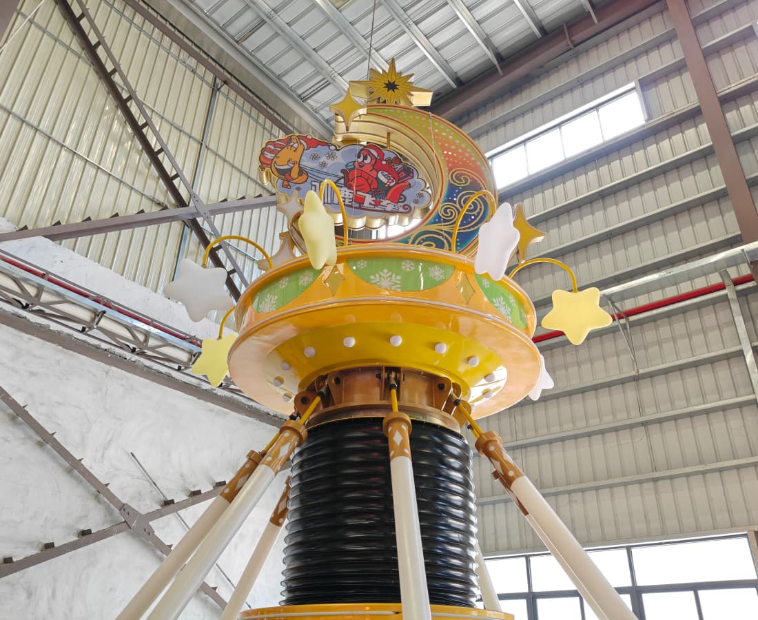 Indoor amusement park drop tower ride with moon and stars themed decorations. - SUNHONG