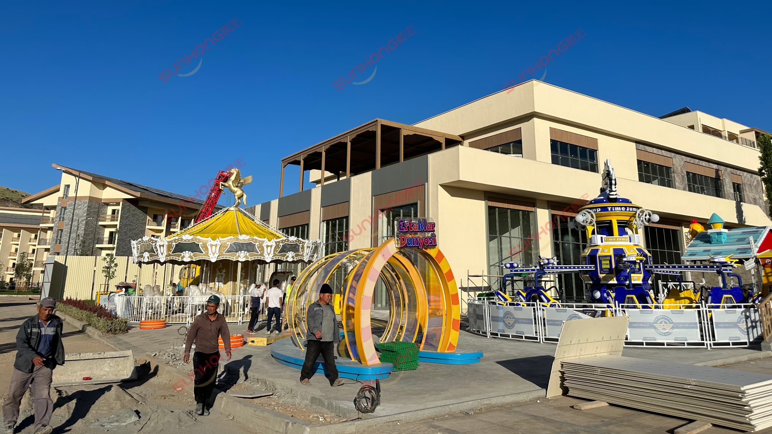 amusement-park-kazakhstan-sunhong-carousel-time-jump-installation.jpg SUNHONG 16-seat carousel and Time Jump ride installation at an amusement park in Kazakhstan.