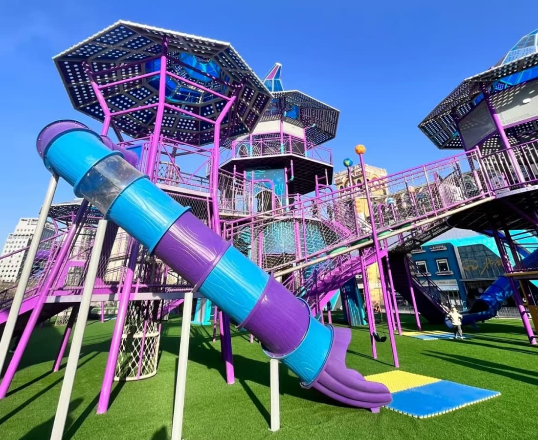 Amusement park ride slide and climbing tower at Government-Backed Larva Park Project, colorful playground structure for kids - SUNHONG