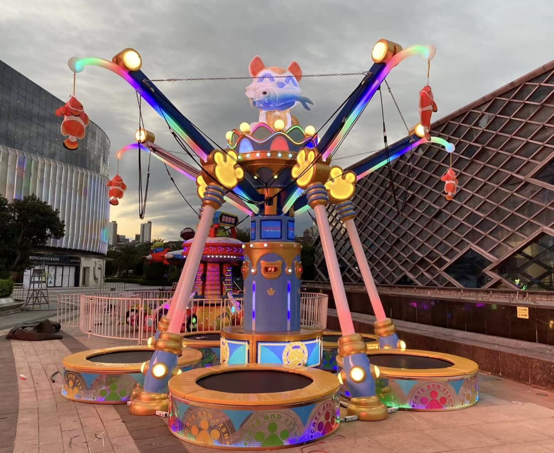 Cat Fishing Trampoline at a commercial plaza in the evening, bungee jumping trampoline attracting families - SUNHONG