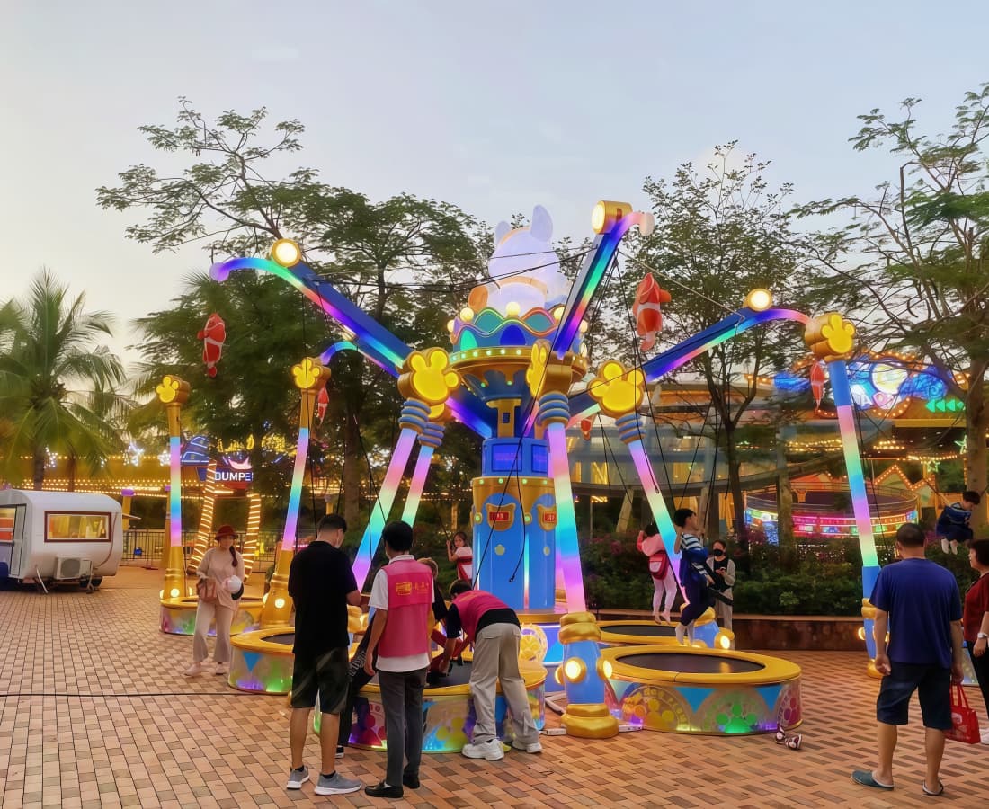 Fathers with kids enjoying Cat Fishing Trampoline at a resort, bungee trampoline for kids and families - SUNHONG