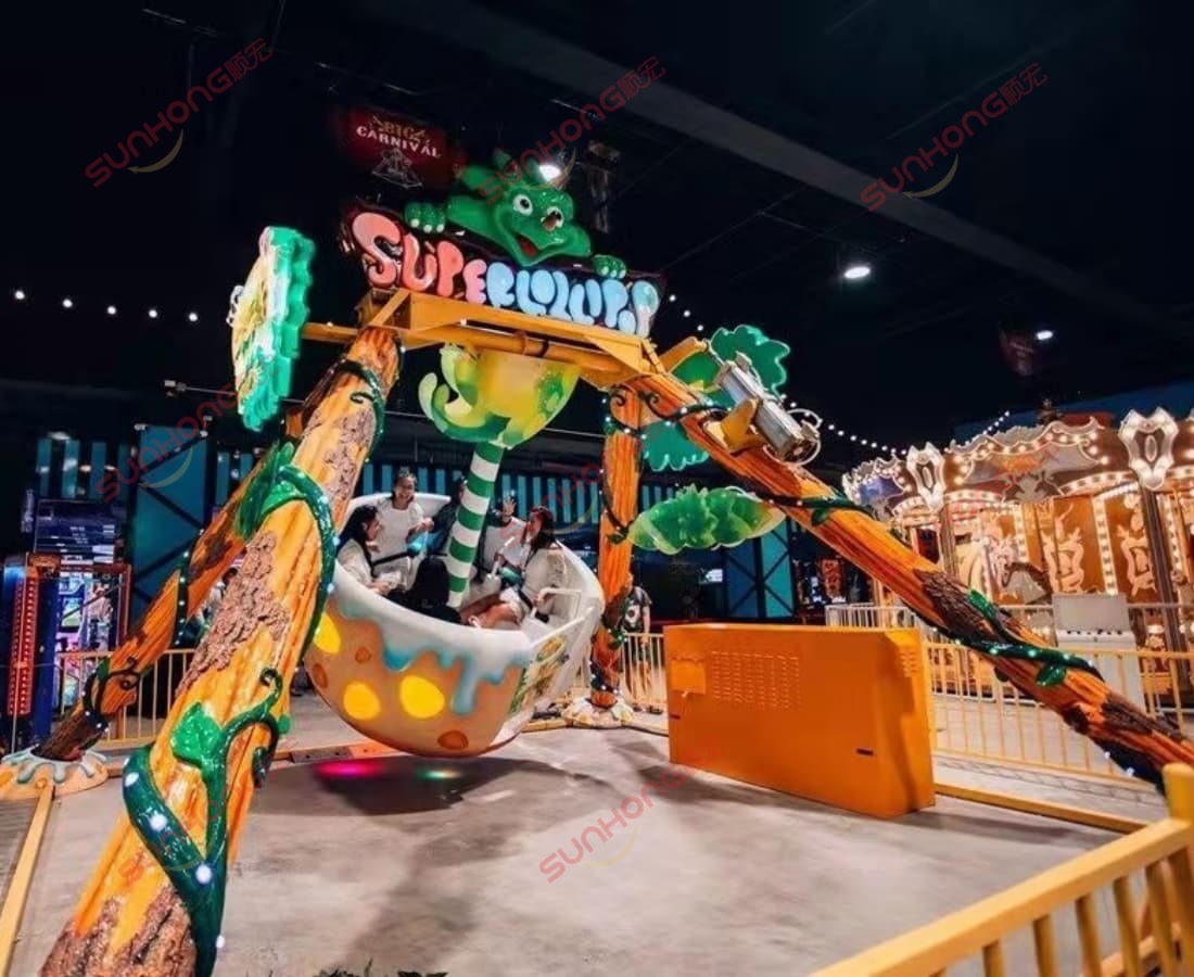 Dinoosaur Pendulum Amusement Ride Dinosaur-themed pendulum amusement ride with IP-customized design, featuring vibrant tree trunks, cartoon dinosaur decorations, and swinging motion at an indoor theme park.