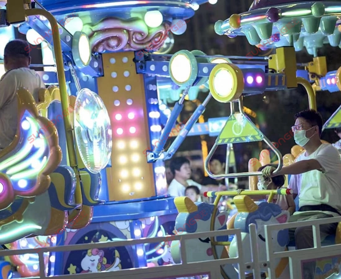 fairy-unicorn-ride-mall-public-scene - SUNHONG Visitors enjoying the Fairy Unicorn Ride in a shopping mall outdoor area, highlighting real-life attraction and popularity among families. - SUNHONG