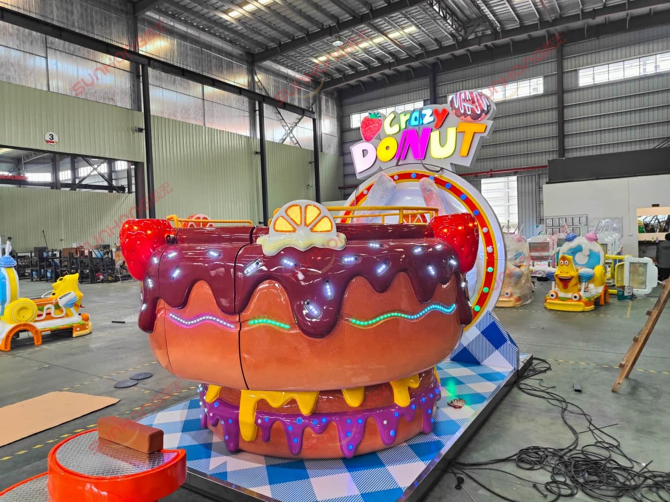 sunhong-crazy-donut-10p-amusement-ride-manufacturing-factory.jpg SUNHONG Crazy Donut-10P amusement ride manufactured in factory workshop showing professional production quality