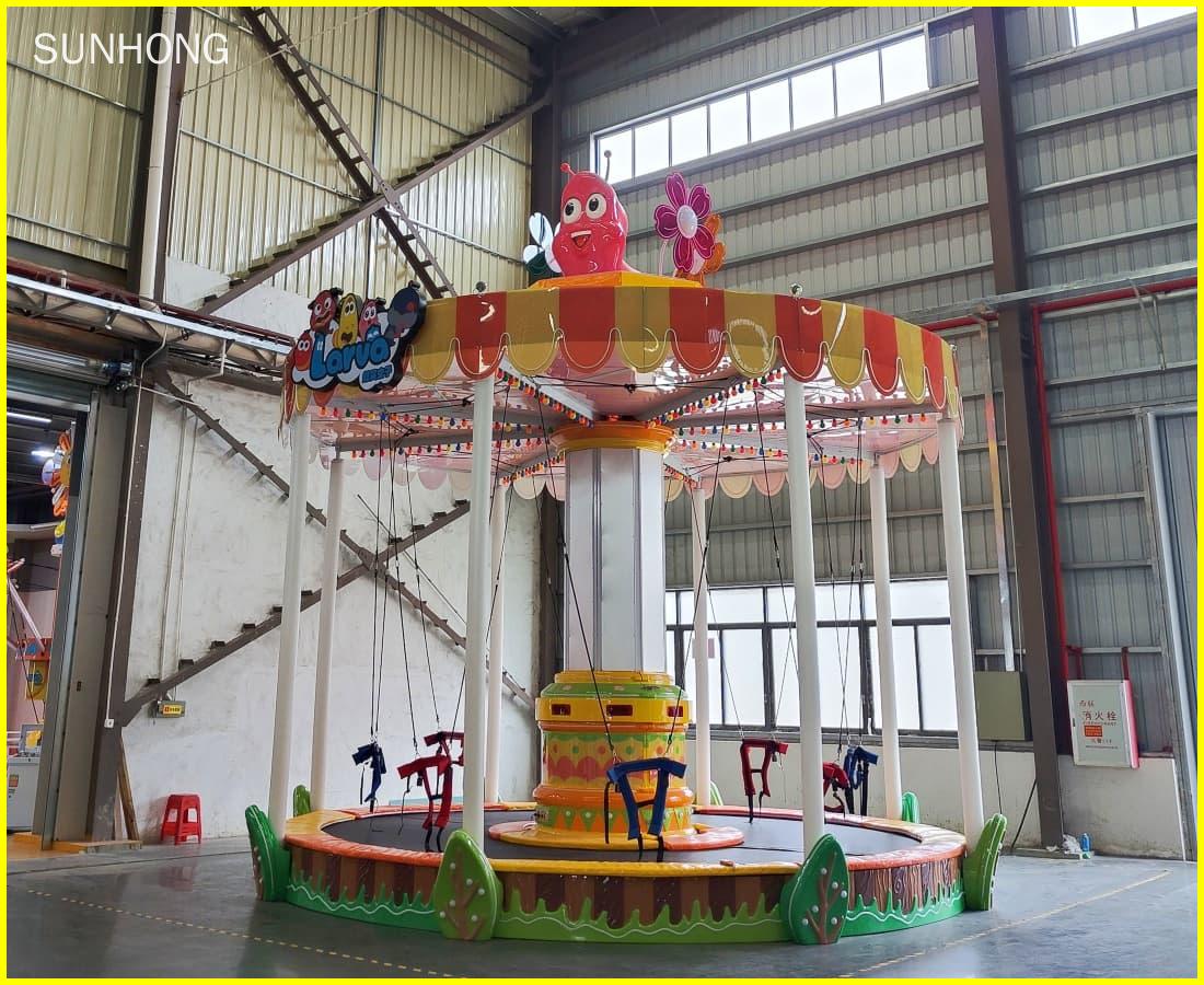 Side view photo of Larva Bungee Party bungee jumping trampoline taken at SUNHONG factory. - SUNHONG