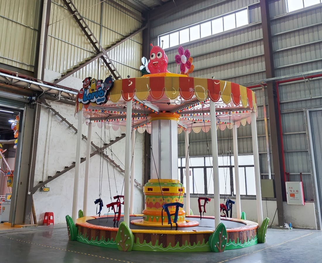 Side view photo of Larva Bungee Party bungee jumping trampoline taken at SUNHONG factory. - SUNHONG