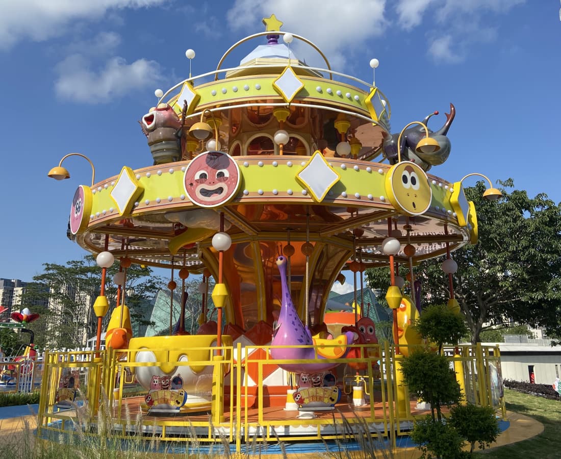 Full view of Larva-themed carousel ride in amusement park with colorful design - SUNHONG