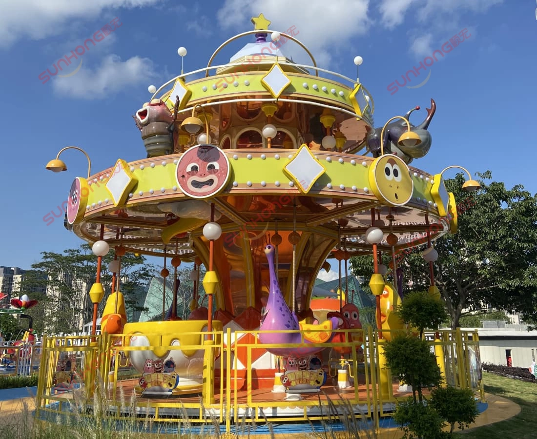 larva-carousel-theme-park-ride-full-view.jpg - SUNHONG Full view of Larva-themed carousel ride in amusement park with colorful design - SUNHONG