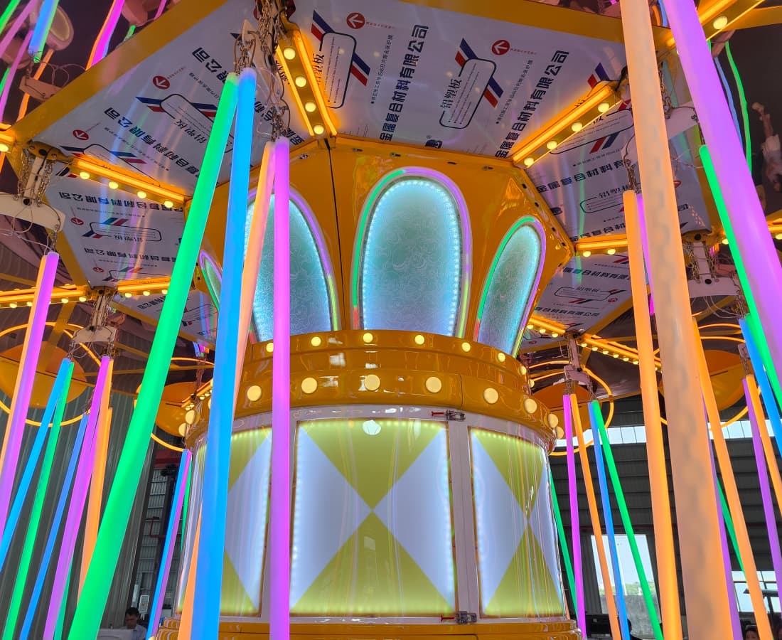 Close-up of the main support pillar of the Larva Flying Chair swing ride at SUNHONG, emphasizing its stability. - SUNHONG