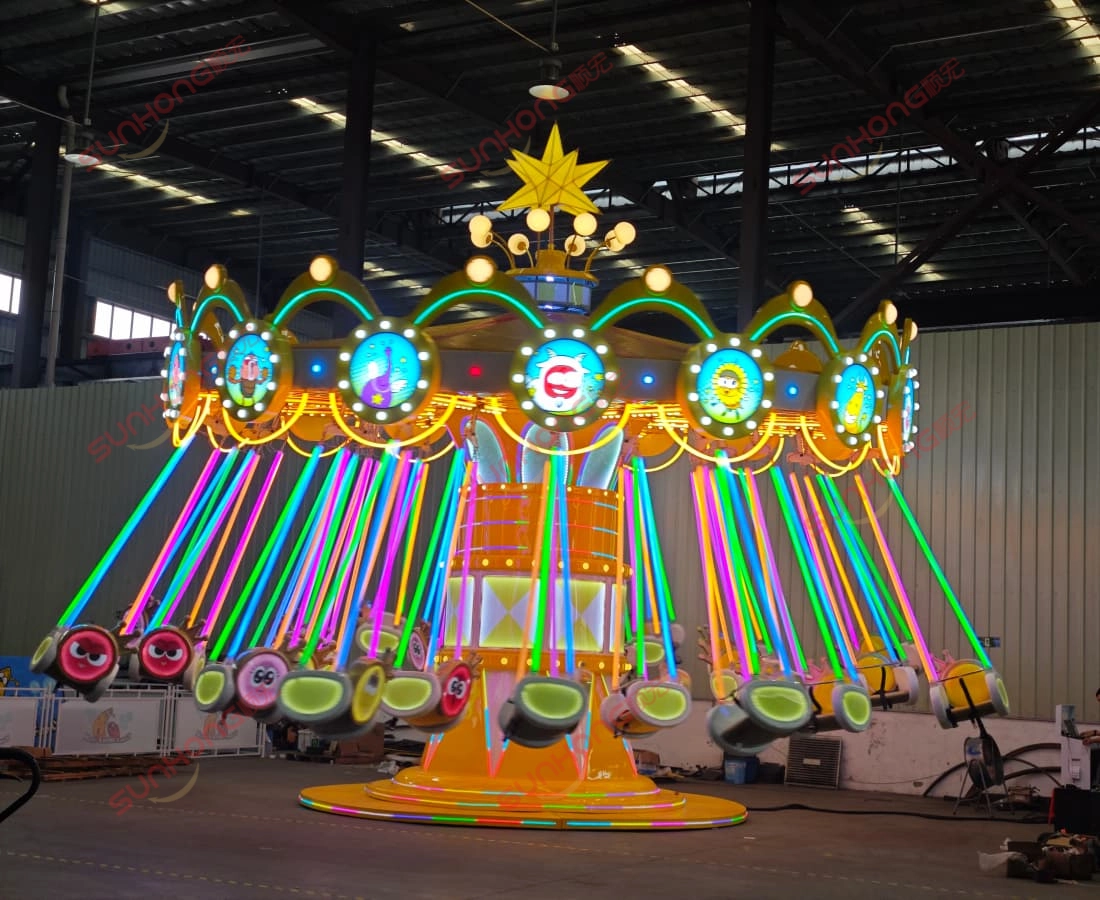 Larva-Flying-Chair-Swing-Ride-Testing-SUNHONG-Factory-Dazzling-Lights.jpg - SUNHONG 在SUNHONG工厂,Larva飞行椅秋千正在进行测试,秋千上升时灯光绚丽。——SUNHONG