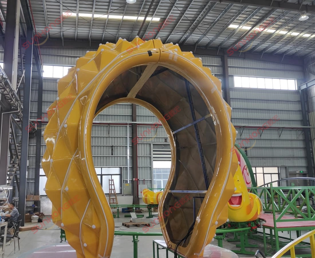 larva-fruitland-mini-roller-coaster-pineapple-gate-detail - SUNHONG Detailed view of the pineapple-shaped shuttle gate on Larva Fruitland mini roller coaster. - SUNHONG