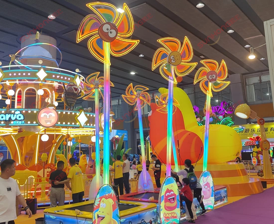 larva-pinwheel-trampoline-showroom-kid-playing - SUNHONG A child playing on the Larva Pinwheel Trampoline at the SUNHONG showroom display - SUNHONG