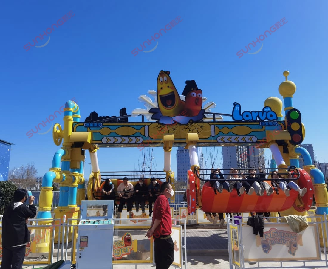 larva-swing-ride-for-sale-community-park-full-seats - SUNHONG Larva Swing ride for sale fully occupied in spacious community park. - SUNHONG