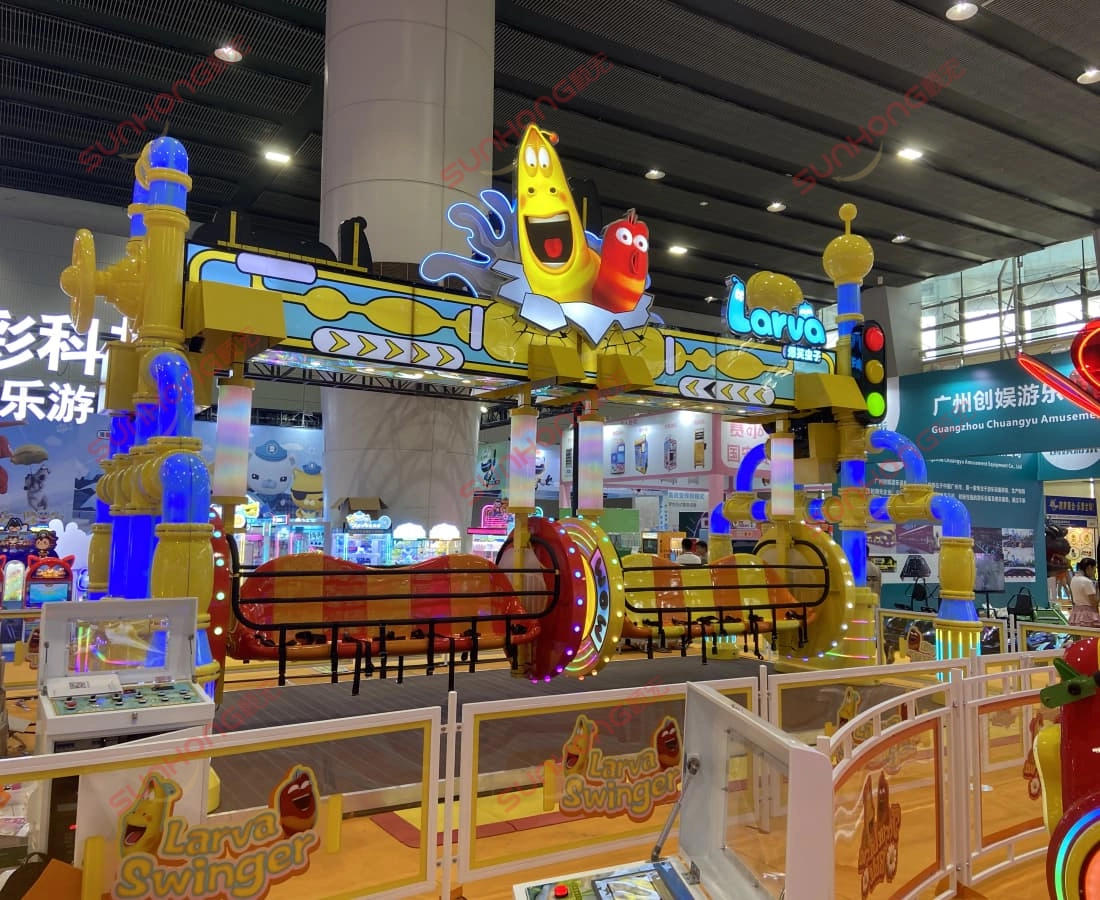 larva-swing-ride-for-sale-sunhong-showroom-investors - SUNHONG Larva Swing ride for sale attracting investor attention in SUNHONG showroom. - SUNHONG