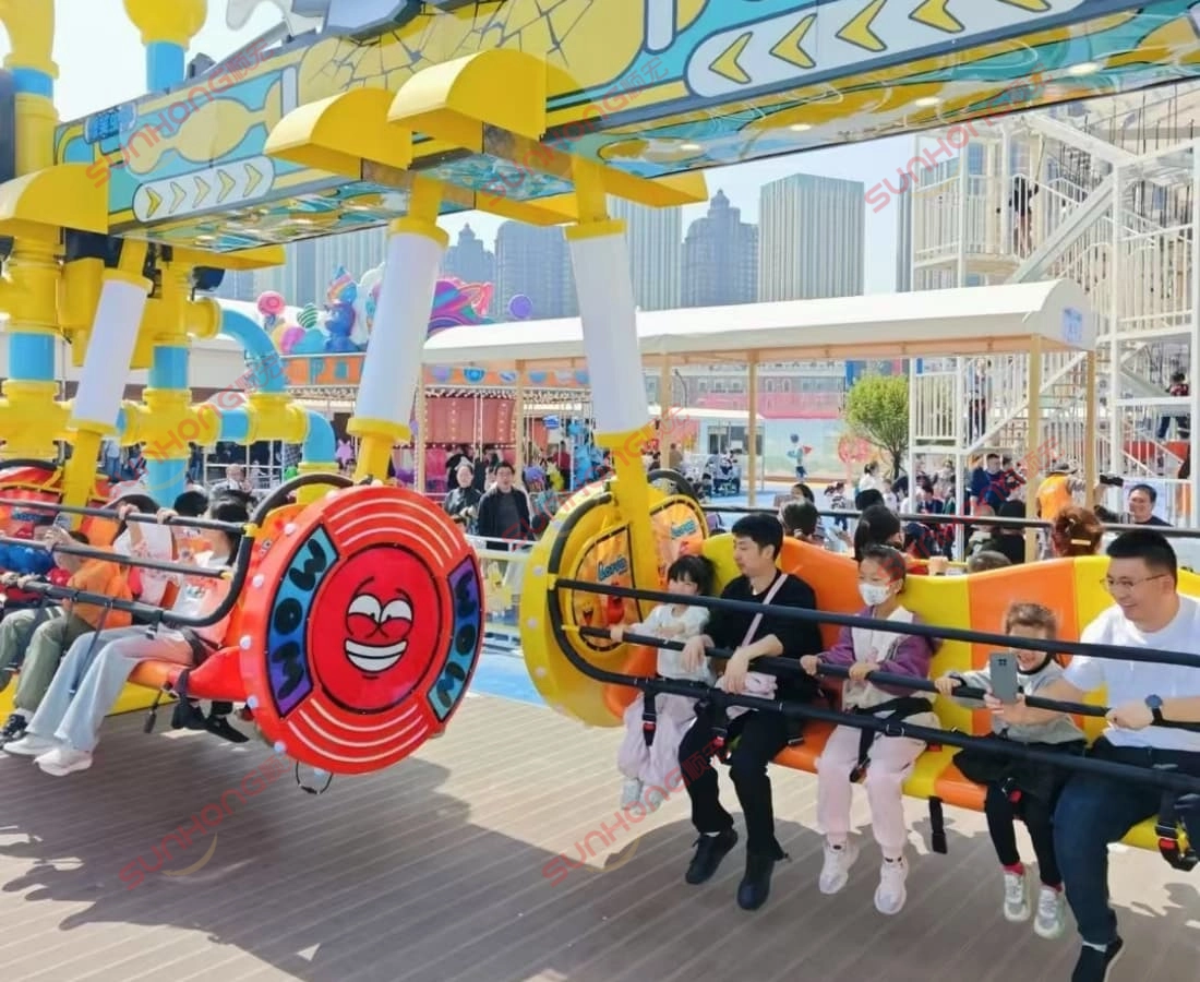 larva-swing-ride-for-sale-theme-park-full-seats - SUNHONG Larva Swing ride for sale fully occupied and widely popular in amusement park. - SUNHONG