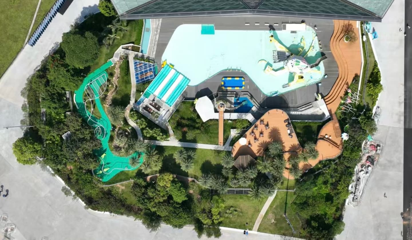 Aerial view: Larva-Themed Park Near Stadium-Before Setting Up. - SUNHONG