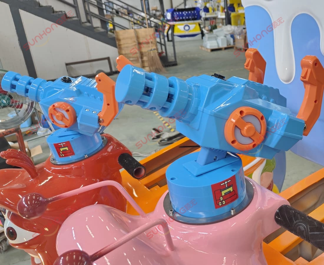 larva-train-game-gun-front-view - SUNHONG Front view of the shooting game gun installed on the Larva Ranger trackless train – fun feature for children. - SUNHONG