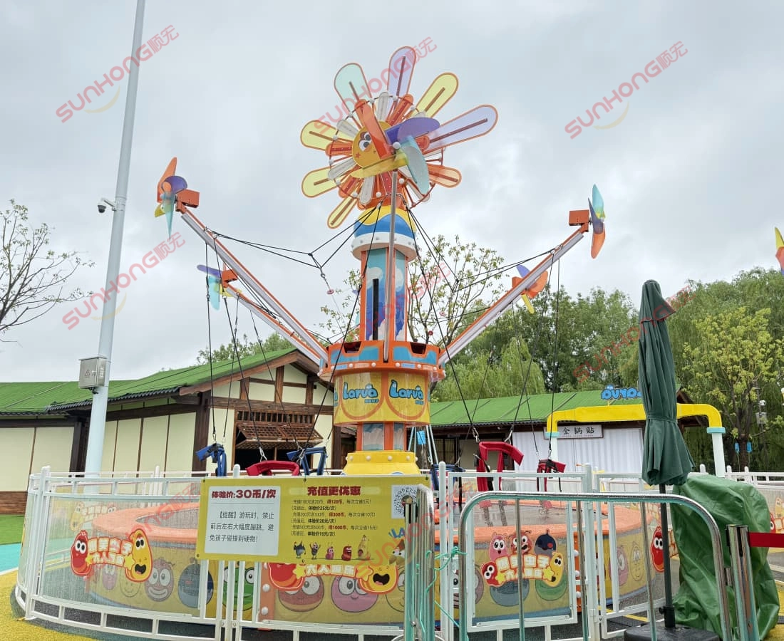 larva-windmill-trampoline-theme-park-3d - SUNHONG 3D rendering of the Larva Windmill Trampoline set in a Larva-themed amusement park background. - SUNHONG