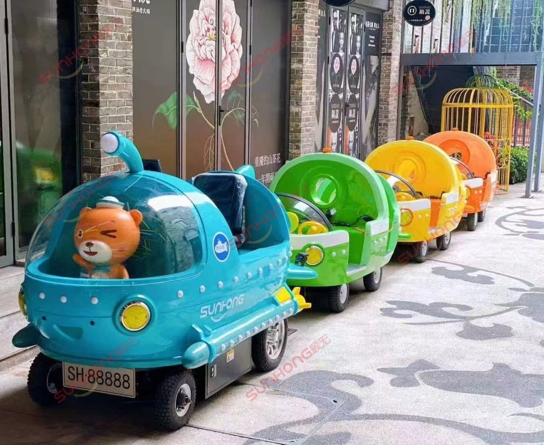 ocean-train-electric-trackless-train-outdoor - SUNHONG Ocean Train electric trackless train parked outdoors with colorful cabins, ideal for family attractions and shopping plazas. - SUNHONG
