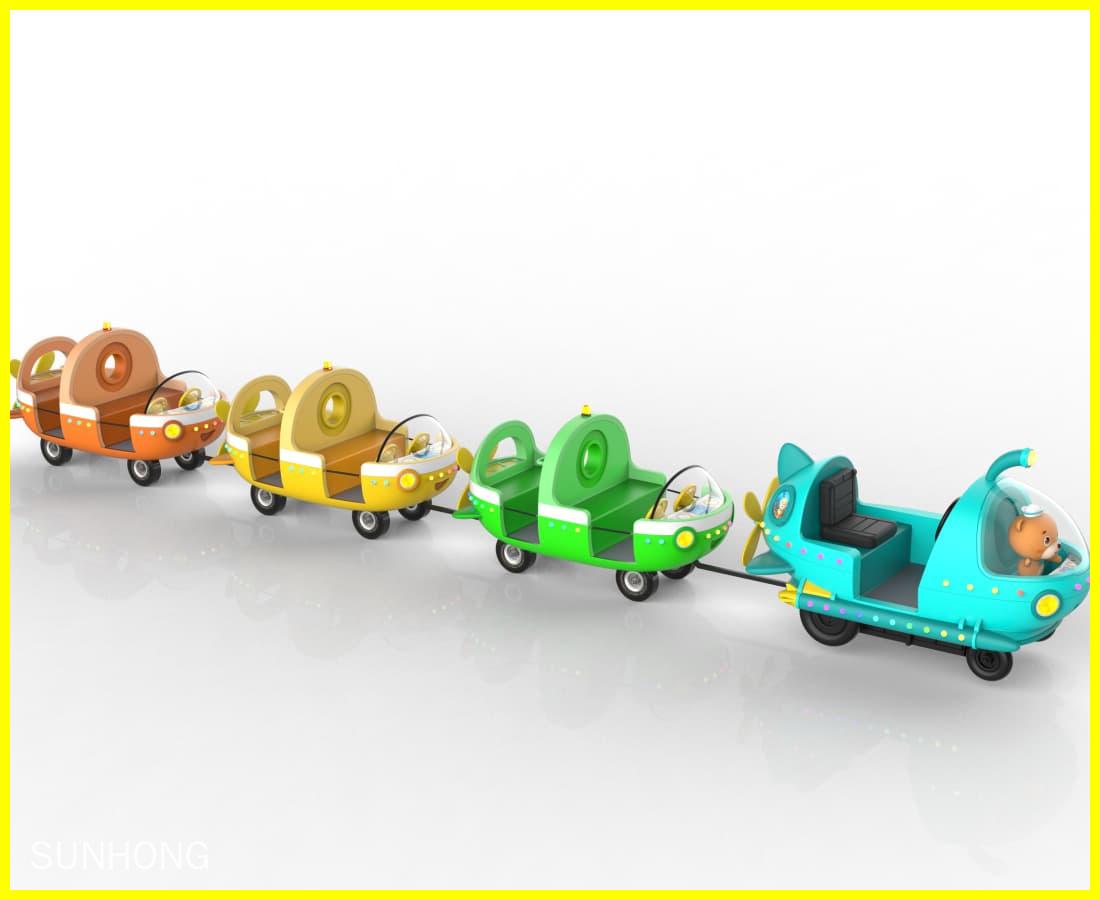 Renderização em ângulo lateral do trem sem trilhos Ocean Train com quatro cabines coloridas, projetado para locais de diversão para toda a família. - SUNHONG