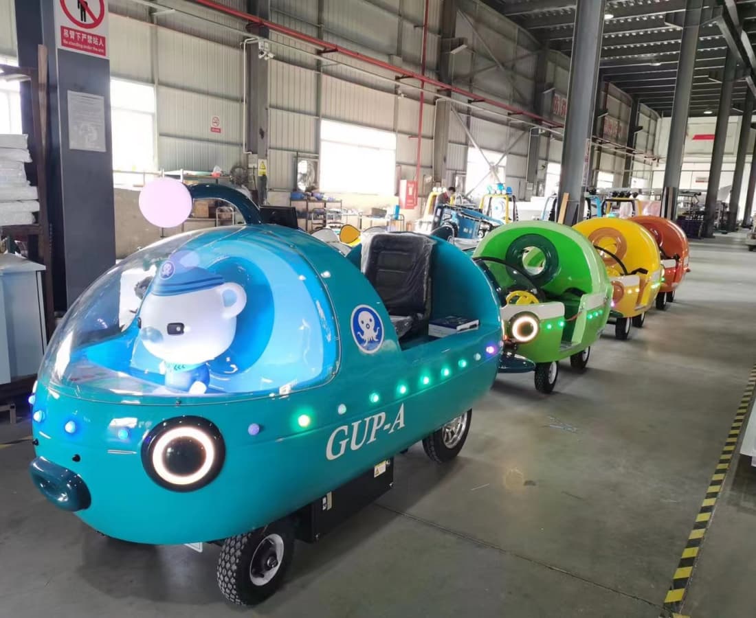 Real-life image of Octonauts 13P trackless train cars for sale in a professional amusement ride manufacturing factory. - SUNHONG