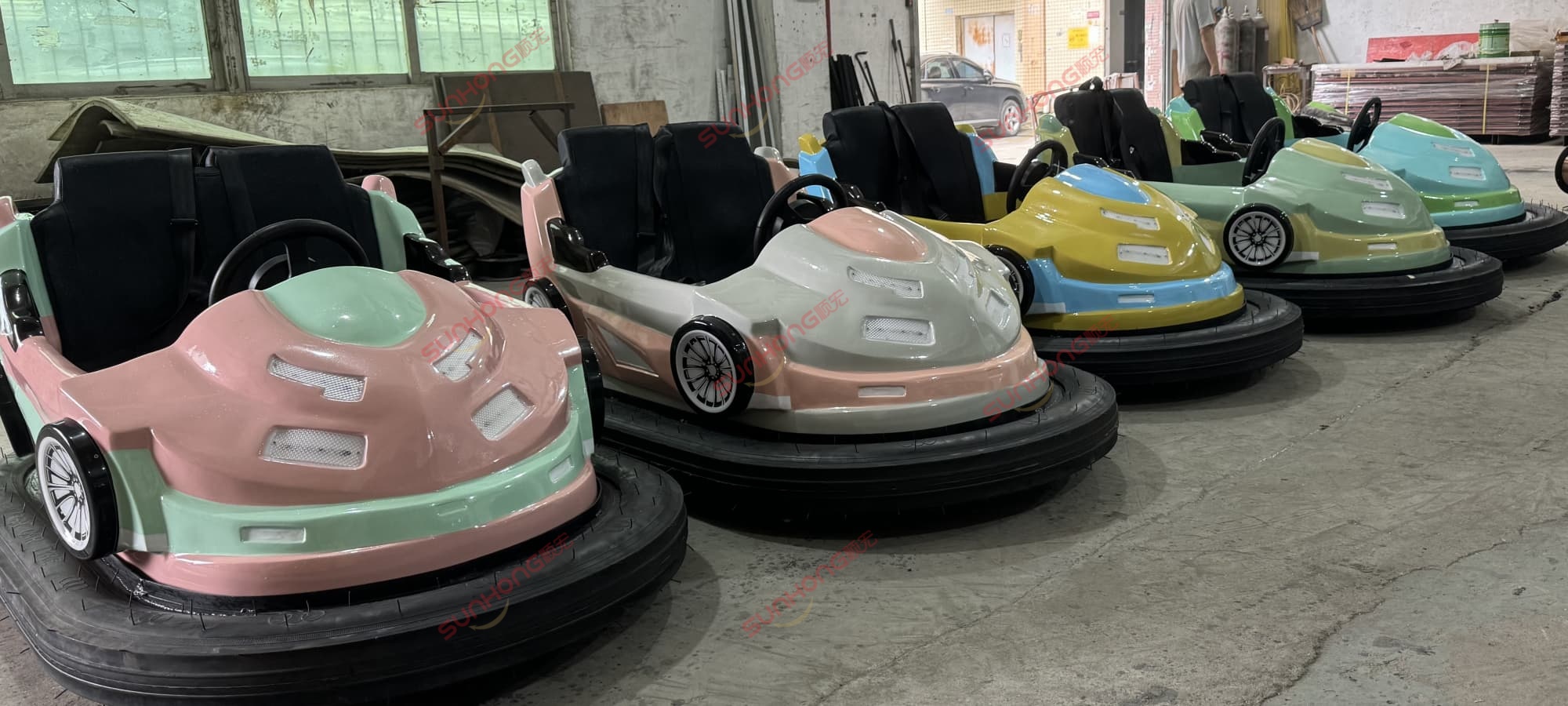 pastel-bumper-cars-for-adults-for-sale Pastel color adult bumper cars for sale in factory setting