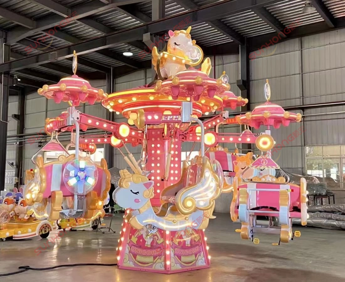 red-fairy-unicorn-ride-sunhong-workshop - SUNHONG Red Fairy Unicorn Amusement Ride on display in SUNHONG's production facility. - SUNHONG