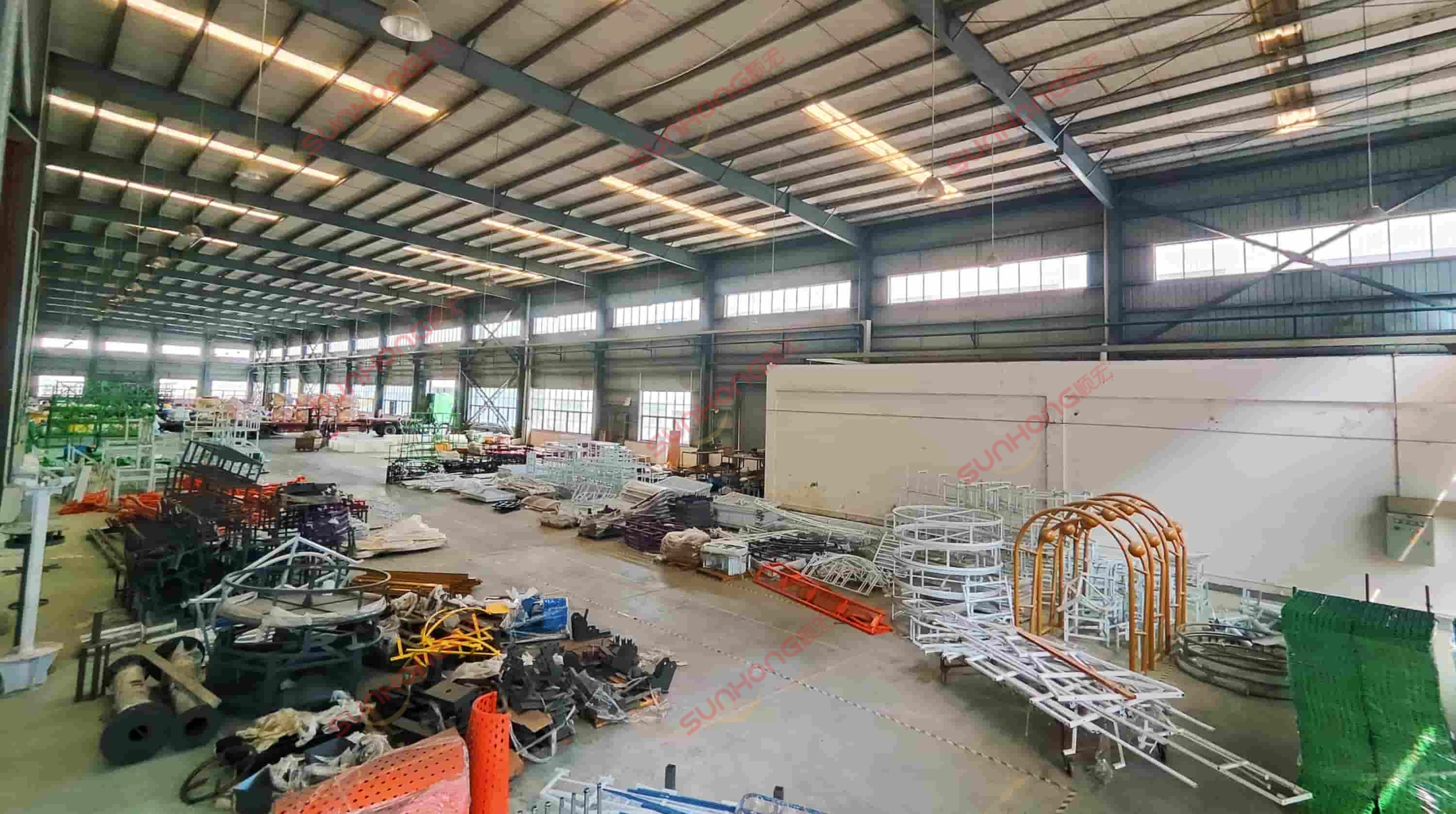 ride-structure-fabrication-workshop - SUNHONG Steel frames and structural components for amusement rides in fabrication stage at SUNHONG theme park ride production base. - SUNHONG