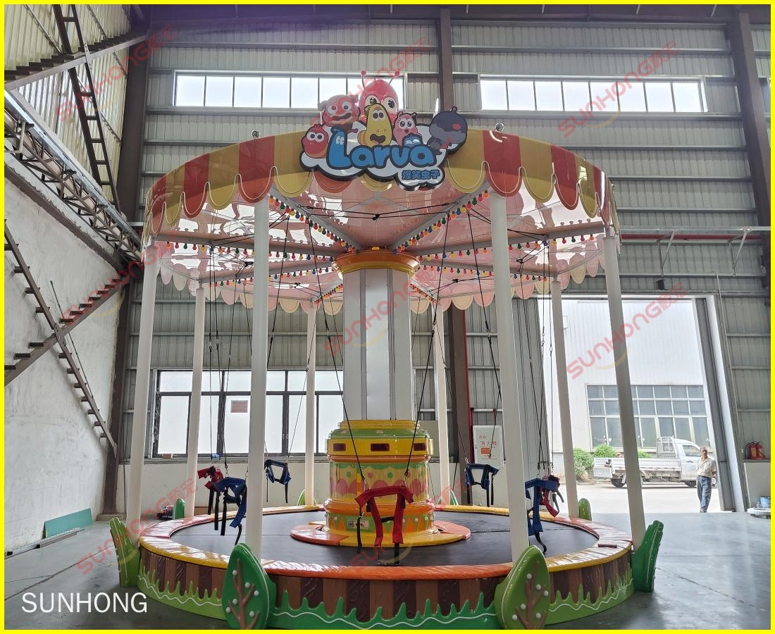 Side view photo of Larva Bungee Party bungee jumping trampoline taken at SUNHONG factory. - SUNHONG