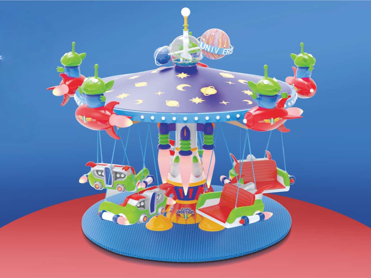 Swing amusement park ride with space and rocket theme, designed for children.