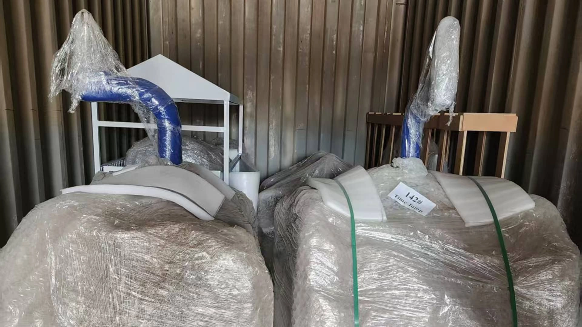SUNHONG amusement attractions are being assembled in a container - SUNHONG