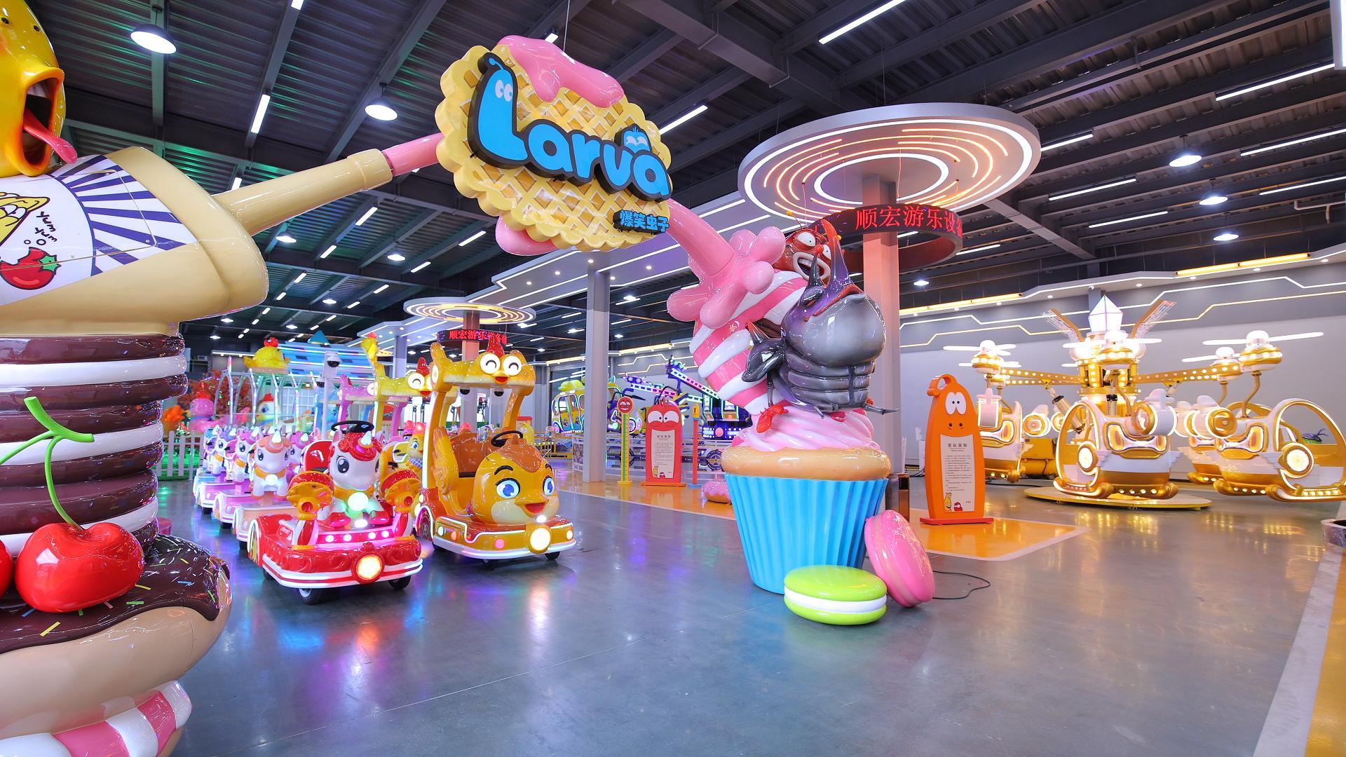 SUNHONG amusement equipment showroom displaying Larva-themed rides - SUNHONG