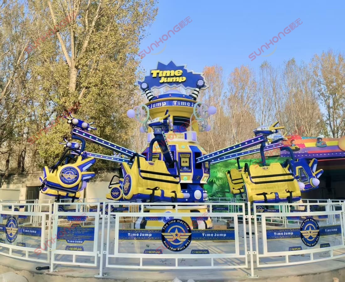 time-jump-ride-in-amusement-park-autumn-trees Time Jump ride in an amusement park with autumn yellow trees in background