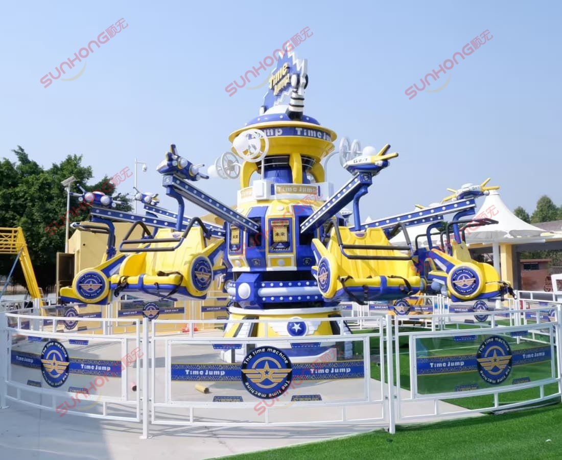 time-jump-ride-on-green-grass-resort Time Jump ride operating on green grass at a resort