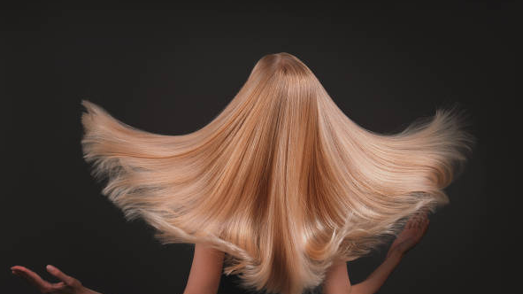 Here's an alt text option for the image:

Long, flowing blonde hair, showcasing the beauty and quality products available from our health and beauty wholesale supplier.