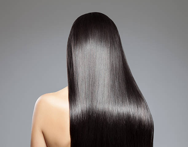 Here's an alt text option:

Long, straight black hair. Black hair care products wholesale.