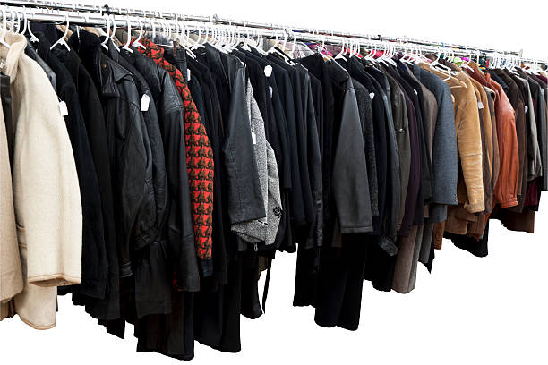 Coats and jackets on hangers.