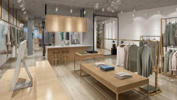 Custom-clothes-display-rack-on-wall-in-boutique. Custom clothes display rack on wall in boutique.