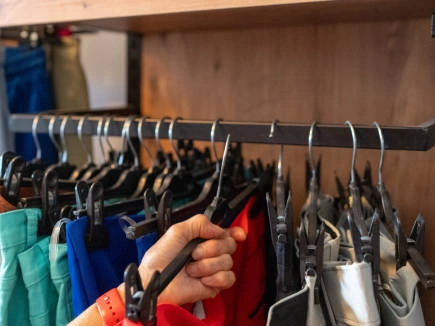 Boutique-clothing-rack-with-colorful-garments. Boutique clothing rack with colorful garments.