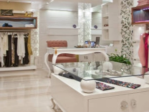 Clothing-shop-rack-design:-Stylish-apparel-on-display-in-a-modern-boutique. Clothing shop rack design: Stylish apparel on display in a modern boutique.