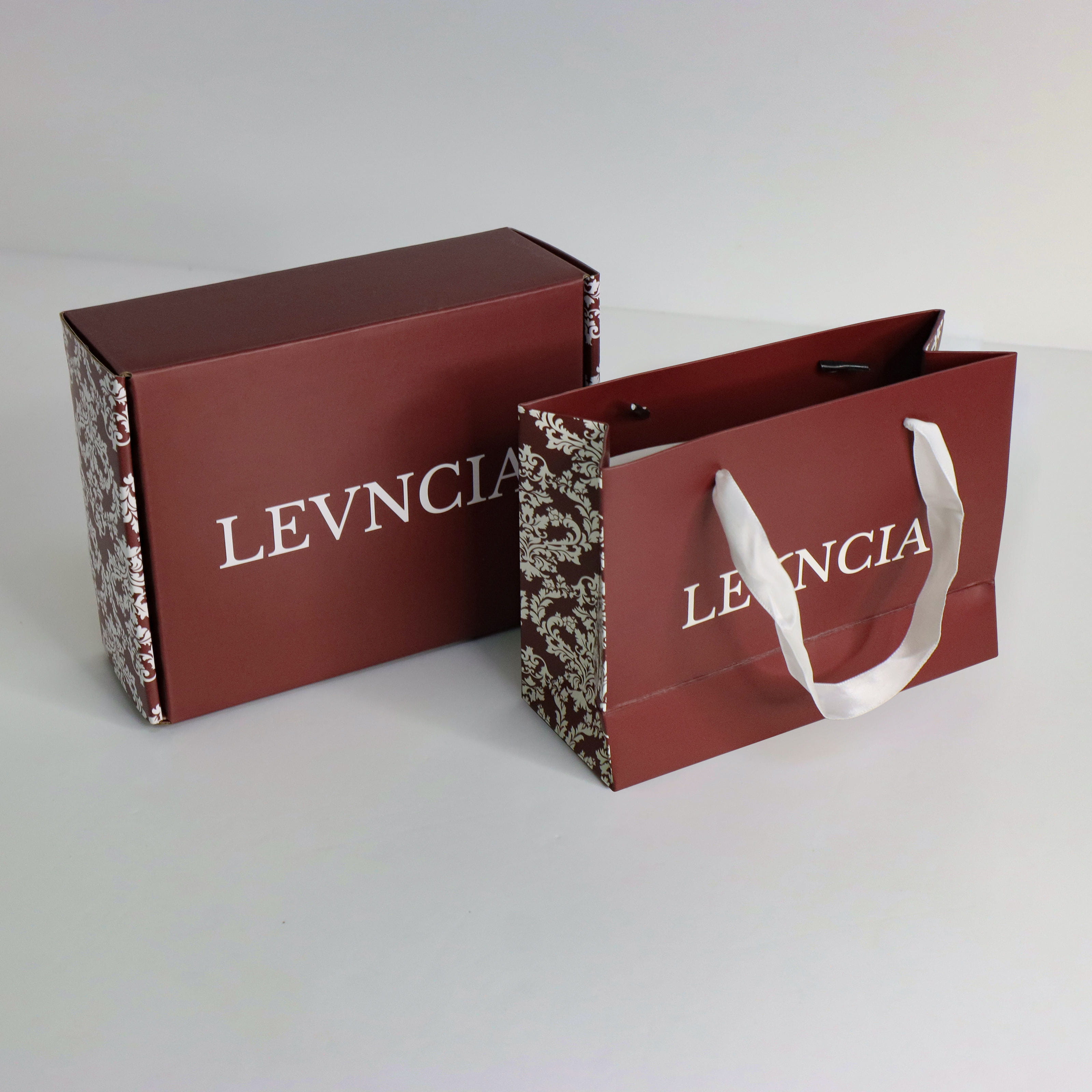 Open cosmetic packaging box with shredded filler