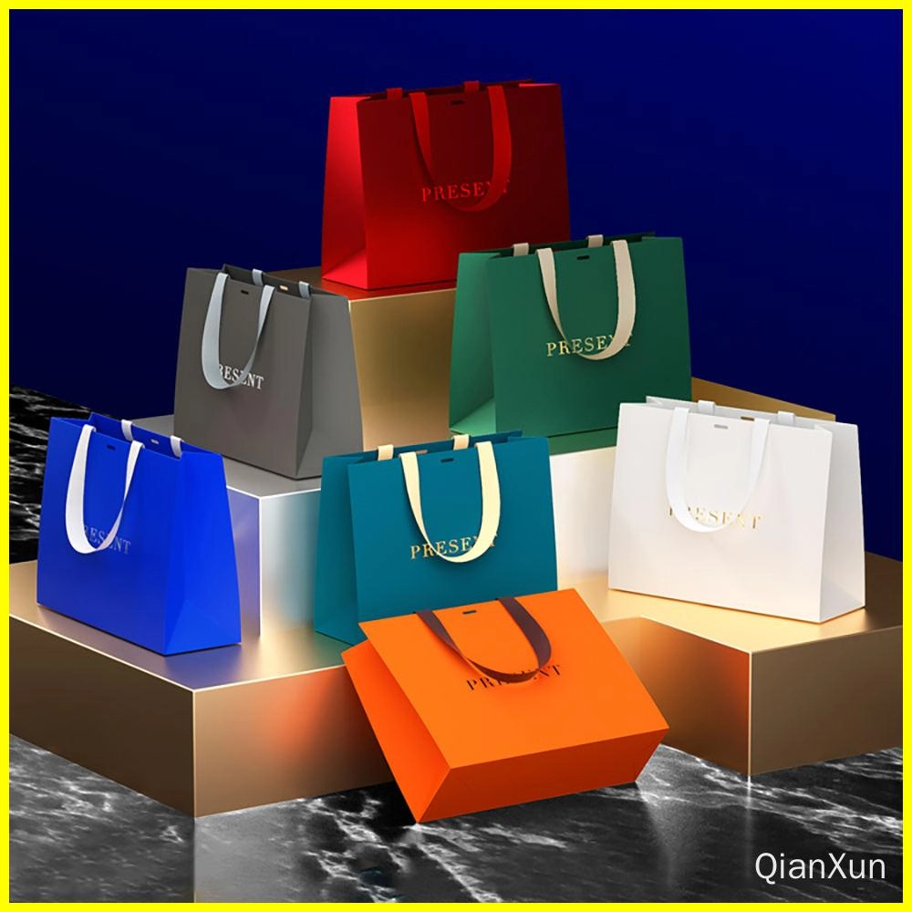 Colorful paper gift bags with strong handles - QianXun