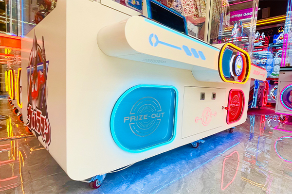 Gift store claw machine with colorful prize-out display.