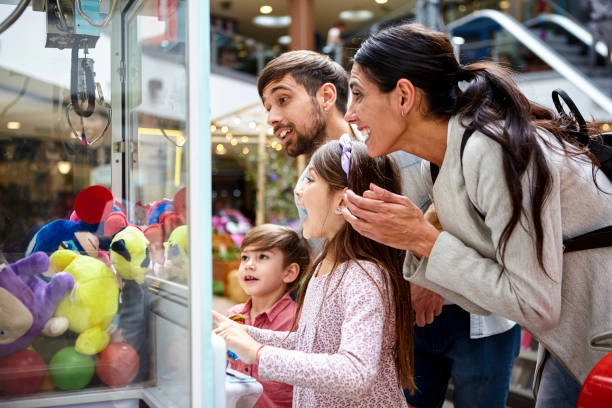 A family use cute claw machine happily.