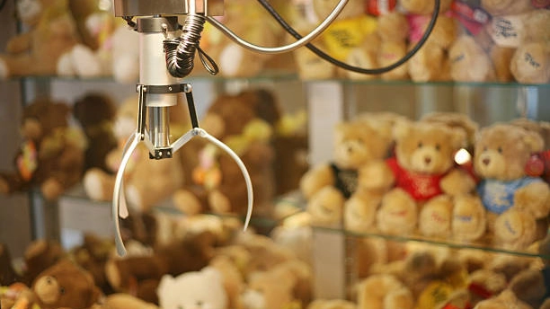 Custom claw machine with teddy bears.